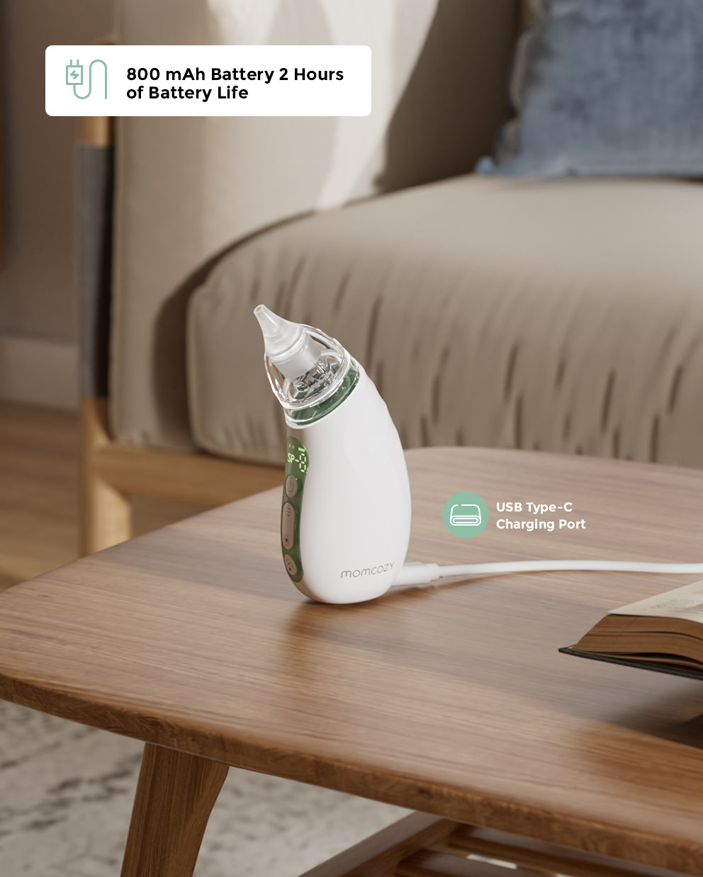 White Momcozy baby nasal aspirator with USB-C charging port, showing 800 mAh battery life for 2 hours.