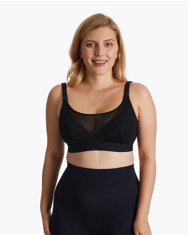 Translation missing: pl.Woman wearing a black ultra-soft and cool breeze pumping and nursing bra HF018 by Momcozy, showcasing adjustable straps and comfortable design. New product badge displayed on top-right corner