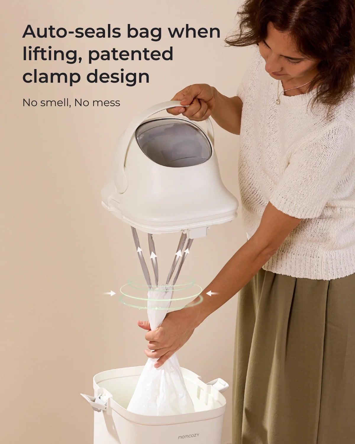 Momcozy Triple-Seal diaper pail with patented auto-seal clamp design for odor control